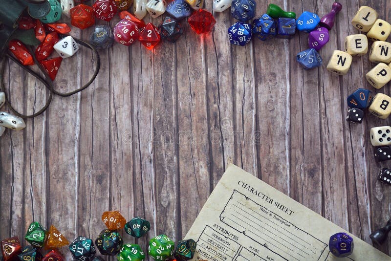 Tabletop role playing flat lay background with colorful RPG dices and character sheet