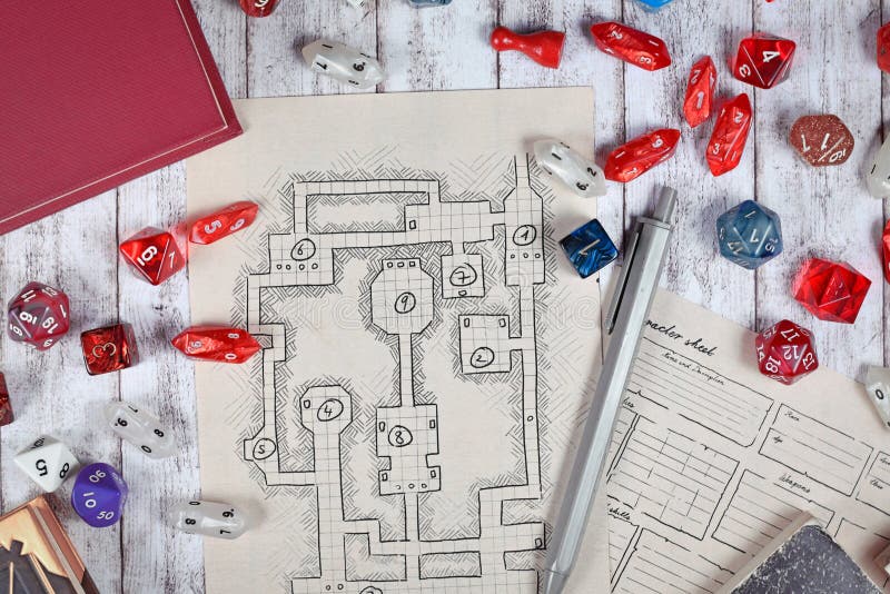 Tabletop role playing flat lay with RPG game dices, hand drawn character sheet, dungeon map and pen