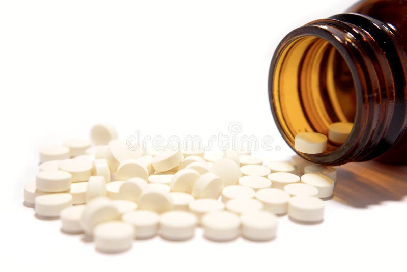 Tabletten en pillenfles stock afbeelding Tabletten en pillenfles stock afbeelding