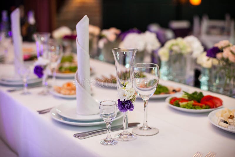 Tablewear and Silverware Closeup at Wedding Reception Table Stock Image
