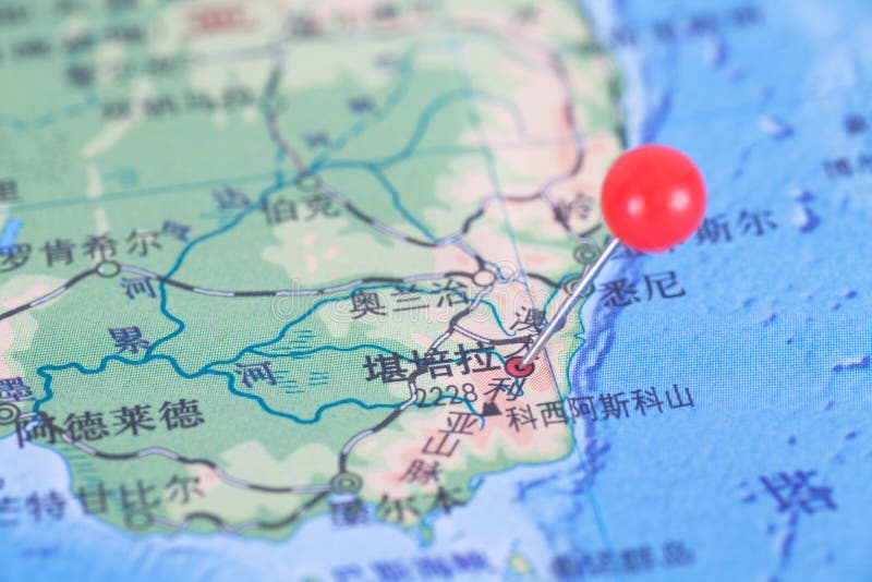 A tack marked the geographic location of Canberra, the capital of Australia, on the map stock photos