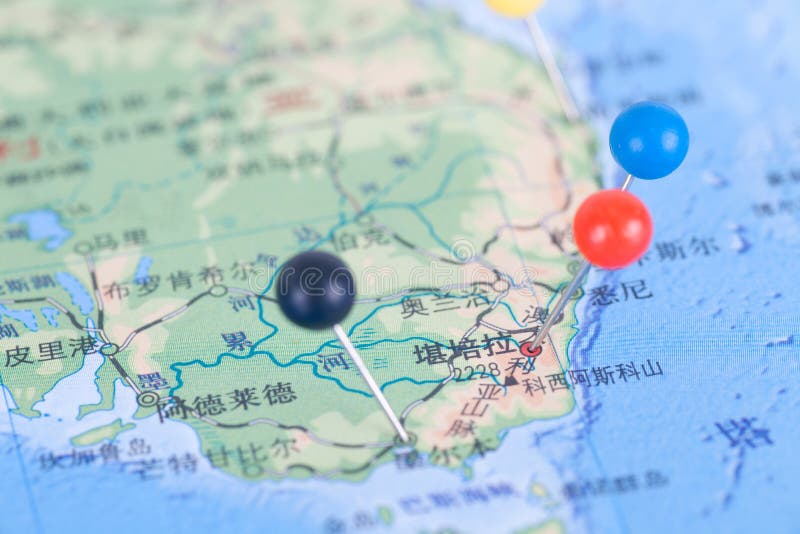 A tack marked the geographic location of Canberra, the capital of Australia, on the map stock photos