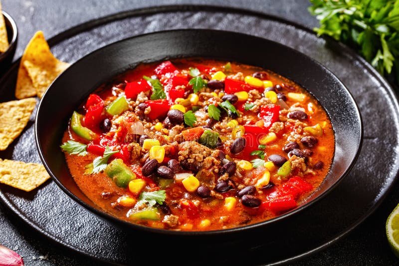 taco soup of ground beef, corn, beans and veggies