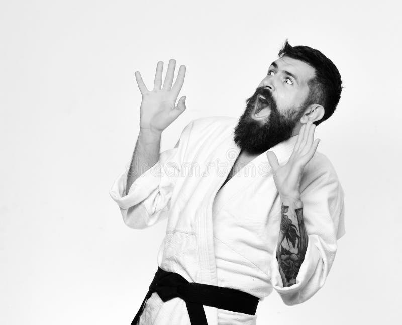 Taekwondo Master Puts Hands Up in Fear and Yells. Karate Man with Scared Face in Uniform Stock Image - Image of beard, healthy: 122611865