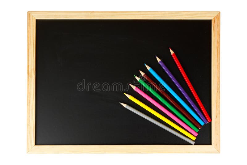 A empty black chalkboard with multicolored pencils. Isolated on white background. A empty black chalkboard with multicolored pencils. Isolated on white background