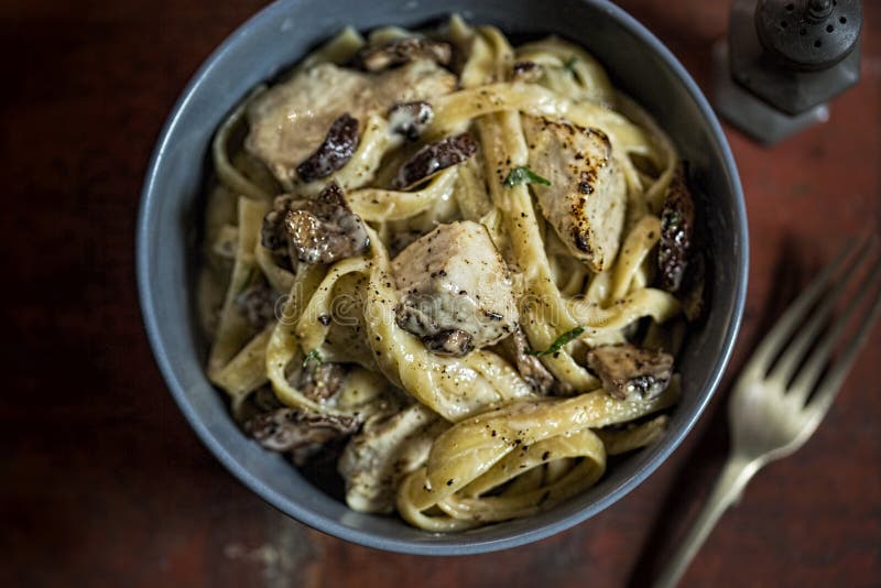 Tagiatelle Pasta with Mushrooms Stock Image - Image of italian, garnish