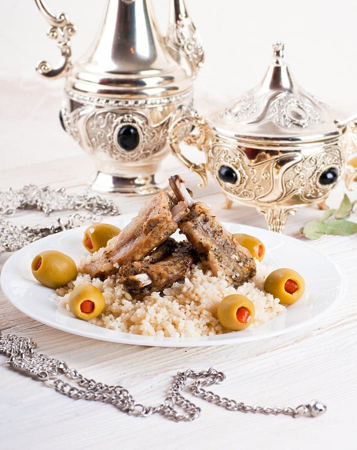 Tagine with Lamb Ribs, Couscous and Olives Stock Photo Image of