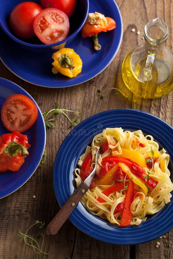 Tagliatelle peperonata stock photos