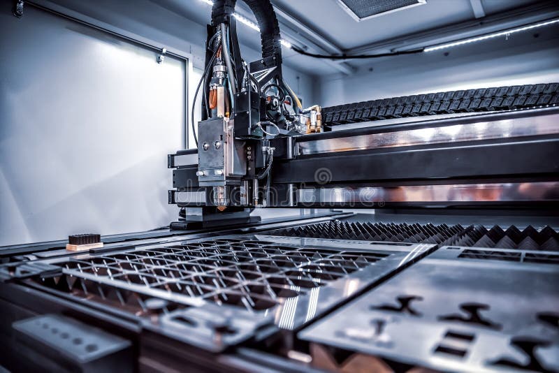 Taglio del metallo, tecnologia industriale moderna del laser di CNC fotografie stock Taglio del metallo, tecnologia industriale moderna del laser di CNC fotografie stock