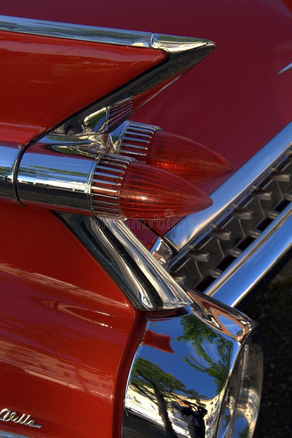 Tail fin of a red vintage car