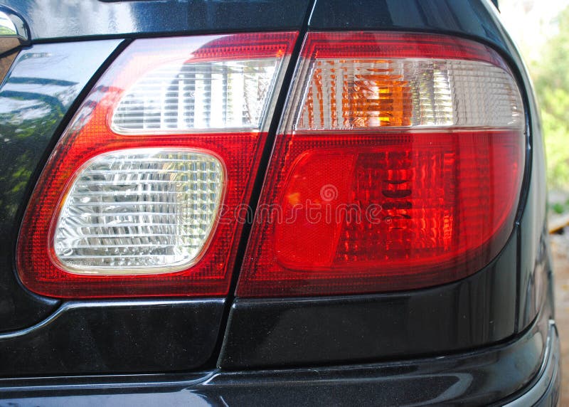 A tail light of Black car