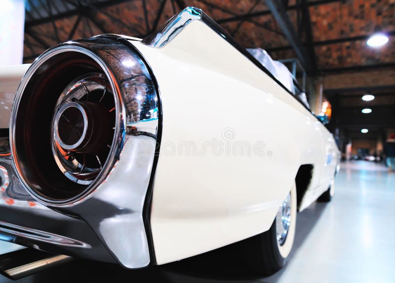 Tail light of white Retro car in garage in Berlin. Tail light of white Retro car in the garage in Berlin, Germany royalty free stock photo Tail light of white Retro car in garage in Berlin. Tail light of white Retro car in the garage in Berlin, Germany royalty free stock photo