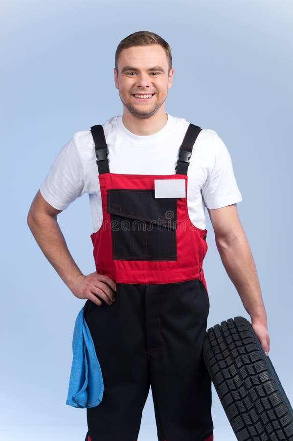 Taille op portret van mechanische holdingsreserveband royalty-vrije stock foto Taille op portret van mechanische holdingsreserveband royalty-vrije stock foto