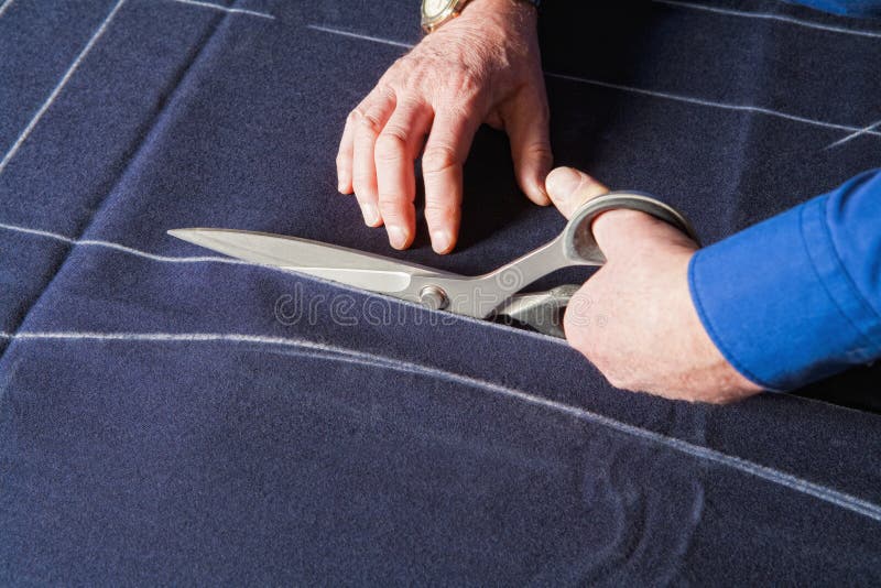 Tailor Cutting Fabric with Scissors. Stock Photo Image of tailor