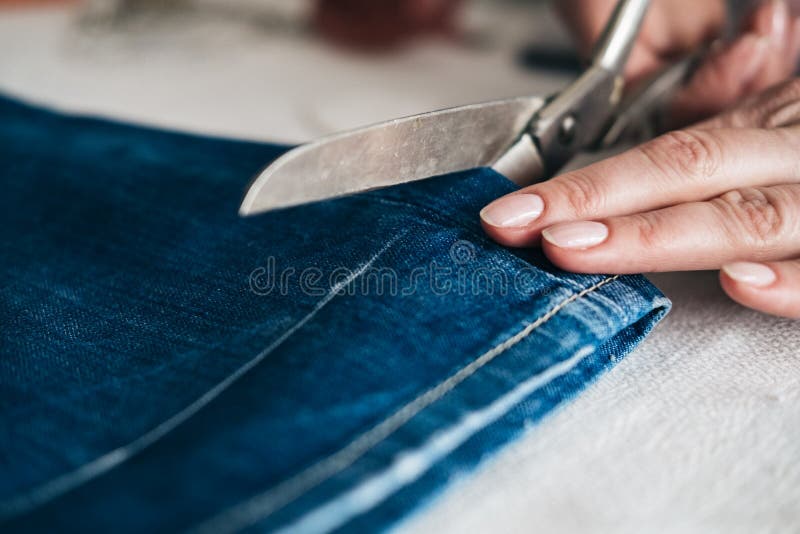 Tailor Sew the Hem of Jeans in Stock Image Image of