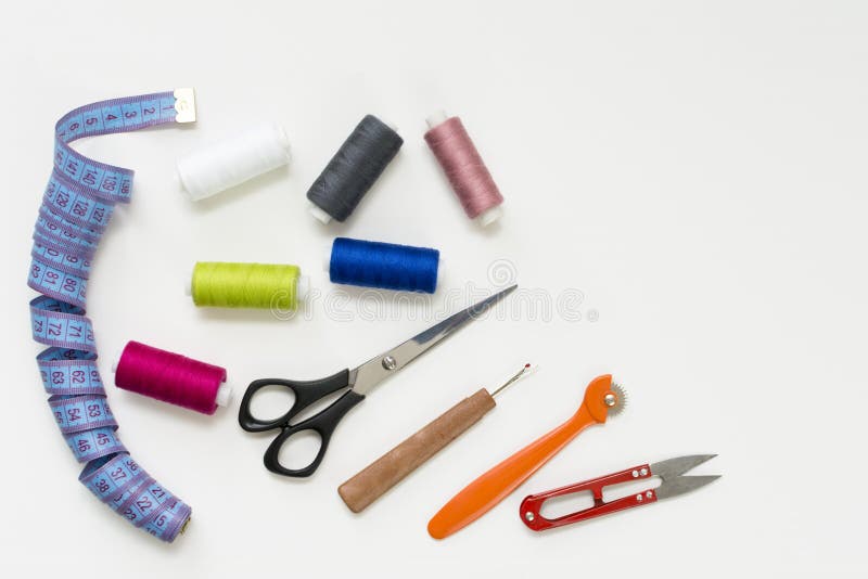 Tailor`s Work Desk. Pattern of Sewing Accessories and Tools on White  Background Top View Copyspace Stock Image - Image of fabric, cloth:  112400499