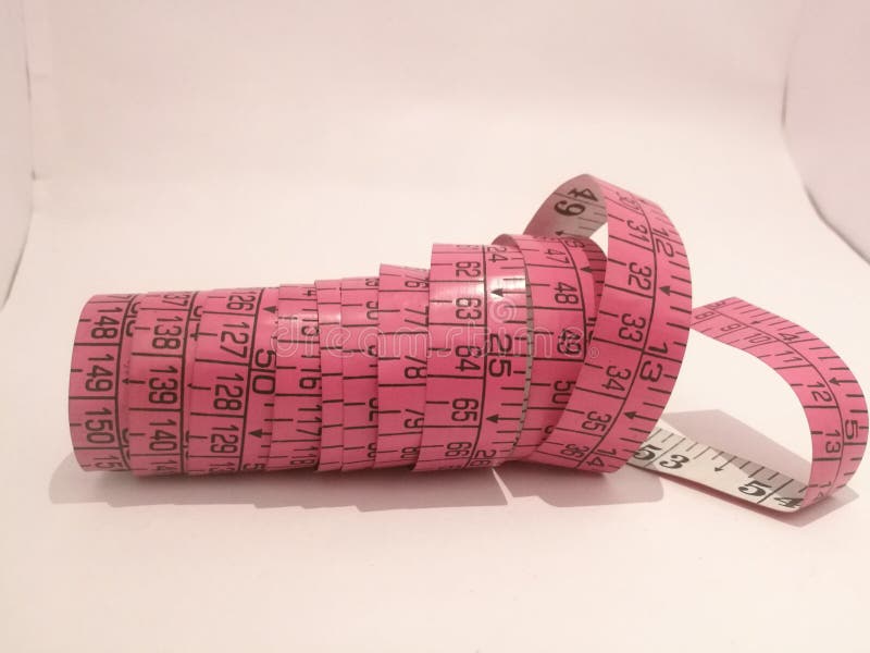 The Tailoring Tape Placed Isolated in a White Background in a Spiral