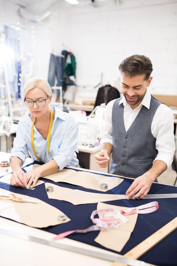 Tailors Working at Table in Atelier Stock Photo - Image of creative ...
