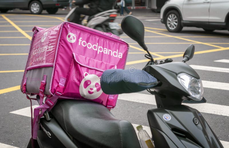 TAIPEI, TAIWAN - JANUARY 09: Foodpanda delivery motorcycle parks on the sidewalk in Shilin in Taipei on January 09, 2020.