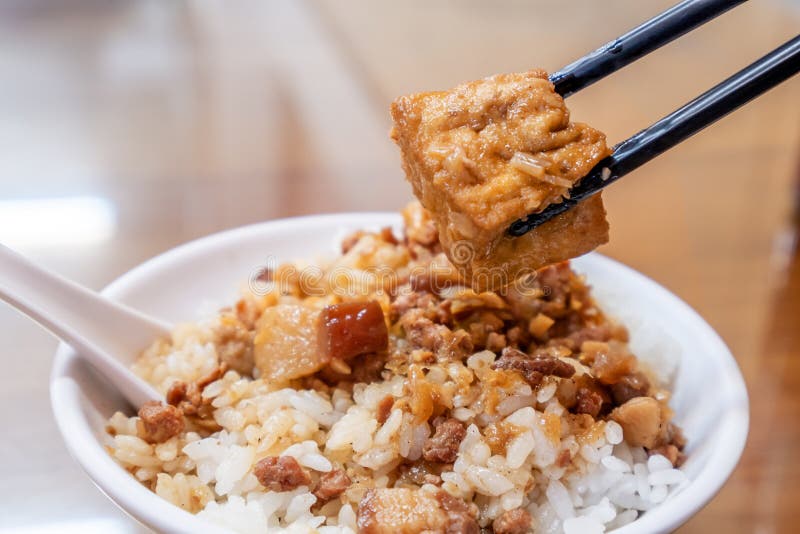 Taiwan Famous Food - Braised Pork and Fried Tofu on Rice. Soy-stewed
