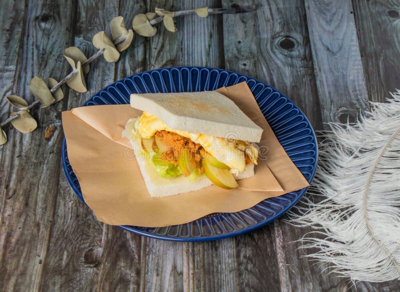 Taiwanese Breakfast Sandwich Apple pork floss egg toast served in plated isolated on wooden background side view of taiwan food,. Pork view stock images, royalty-free photos and pictures