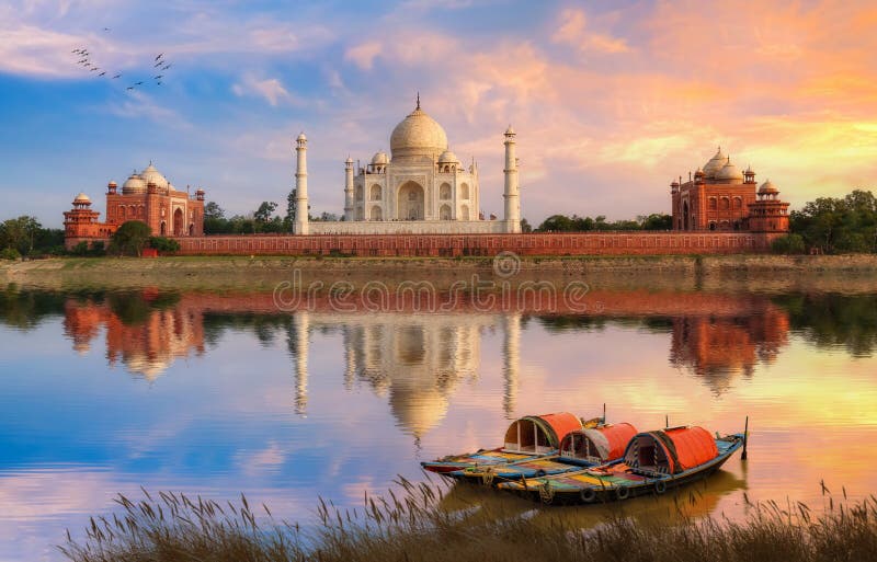 Taj Mahal Agra scenic sunset view with boats on the banks of river Yamuna at Agra India