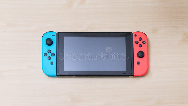 Tajlandia Bangkok, MAJ, - 7, 2018 Nintendo Przełącznikowa gemowa konsola dalej obrazy royalty free Tajlandia Bangkok, MAJ, - 7, 2018 Nintendo Przełącznikowa gemowa konsola dalej obrazy royalty free