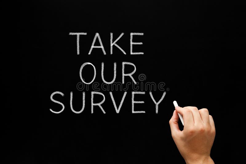 Take Our Survey Handwritten On Chalkboard stock image