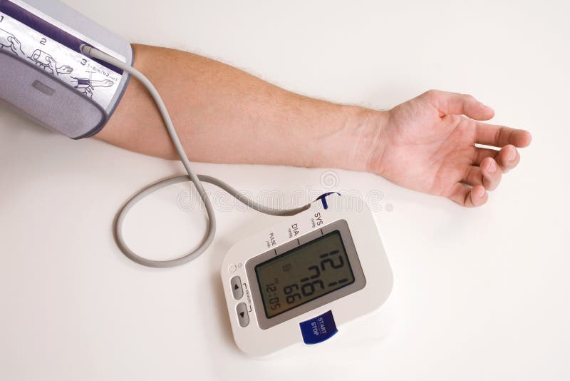 Taking blood pressure stock image. Image of machine, electronic 1256561