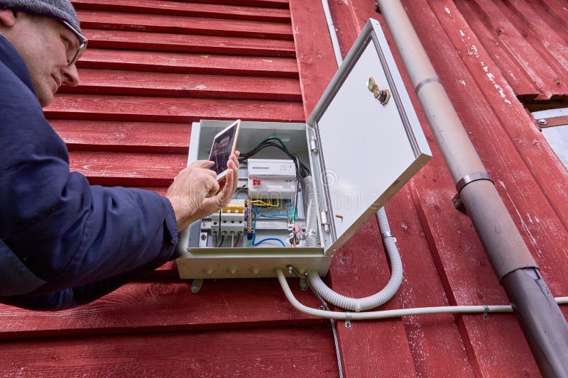 Taking Electric Meter Readings With Smartphone Homeowner Takes taking-electric-meter-readings-with-smartphone-homeowner-takes