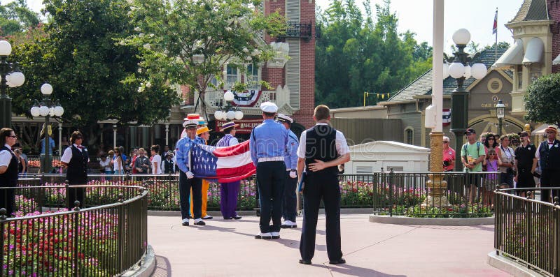 Taking the flag down at Magic Kingdon, Orlando, FL.