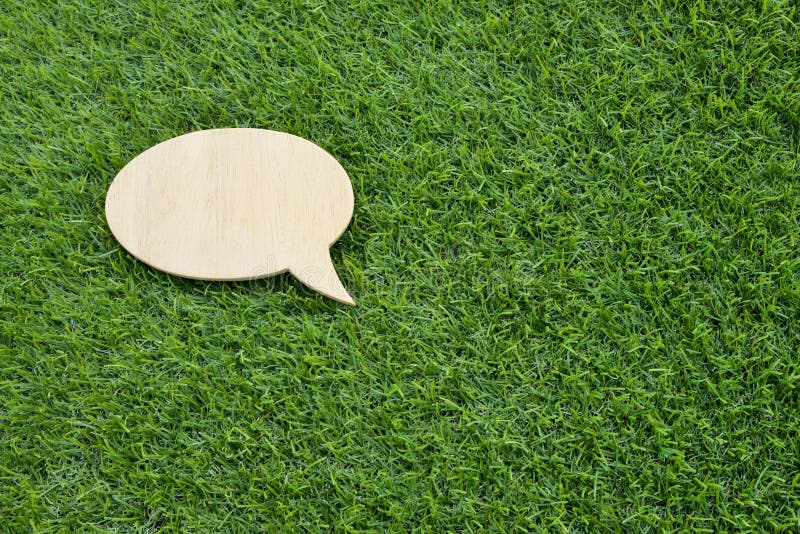 Talk bubble speech icon. blank empty bubbles design elements on grass background. Chat on line symbol. copy space.
