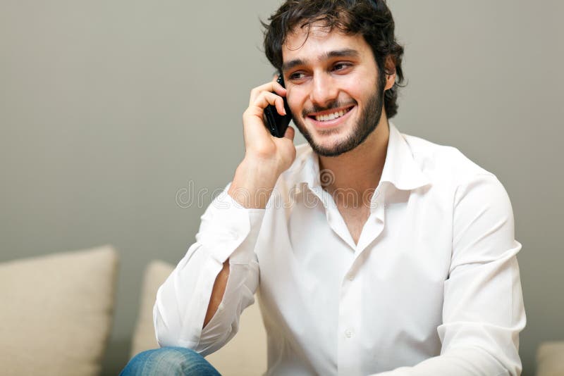 Talking on the Phone on His Couch Stock Photo Image of smartphone