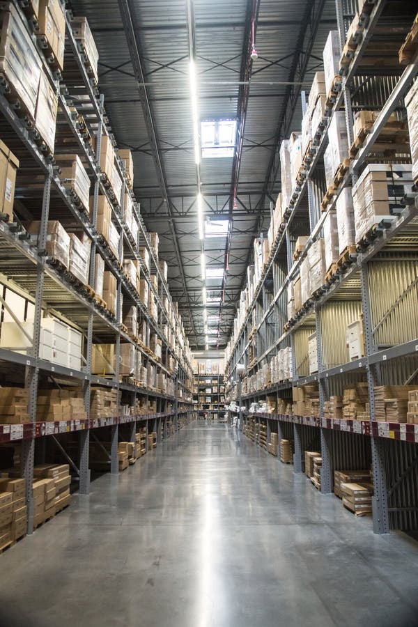 Tall Shelves in a Warehouse Stock Photo Image of hallway, logistics