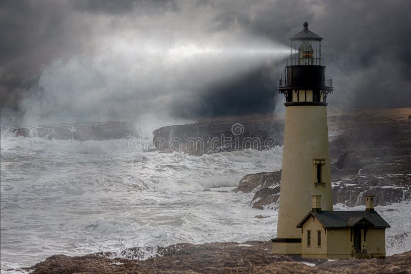 A tall whit lighthouse shinning light at night in a storm with a rough ocean and fog