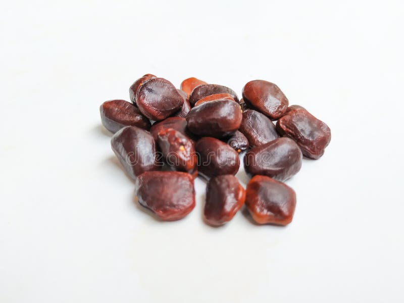 Tamarind Fruit Seeds Pile And Texture On White Background Stock Photo