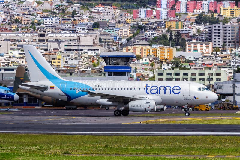 TAME Ecuador Airbus A319 airplane Quito airport. Quito, Ecuador June 13, 2011: TAME Ecuador Airbus A319 airplane at Quito airport UIO in Ecuador. Airbus is a royalty free stock photos TAME Ecuador Airbus A319 airplane Quito airport. Quito, Ecuador June 13, 2011: TAME Ecuador Airbus A319 airplane at Quito airport UIO in Ecuador. Airbus is a royalty free stock photos