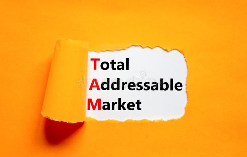 TAM total addressable market symbol. Concept words TAM total addressable market on white paper on a beautiful orange background. Business TAM total addressable market concept. Copy space. TAM total addressable market symbol. Concept words TAM total addressable market on white paper on a beautiful orange background. Business TAM total addressable market concept. Copy space