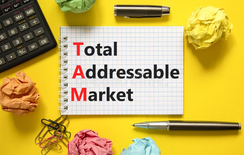 TAM total addressable market symbol. Concept words TAM total addressable market on white note on a beautiful yellow background. Calculator. Business TAM total addressable market concept. Copy space. TAM total addressable market symbol. Concept words TAM total addressable market on white note on a beautiful yellow background. Calculator. Business TAM total addressable market concept. Copy space