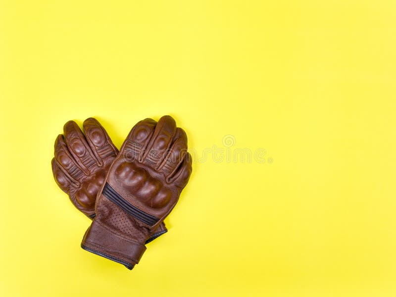 Tan Brown Leather Gloves for Riding a Motorcycle or Bicycle Stock Image