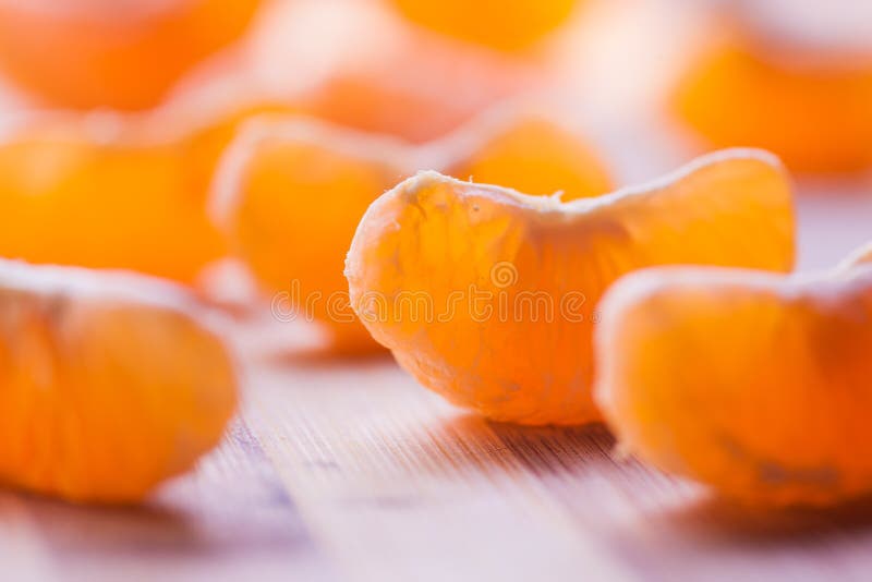 Tangerine Balanced on a Composition of 2 Intertwined Forks Stock Image