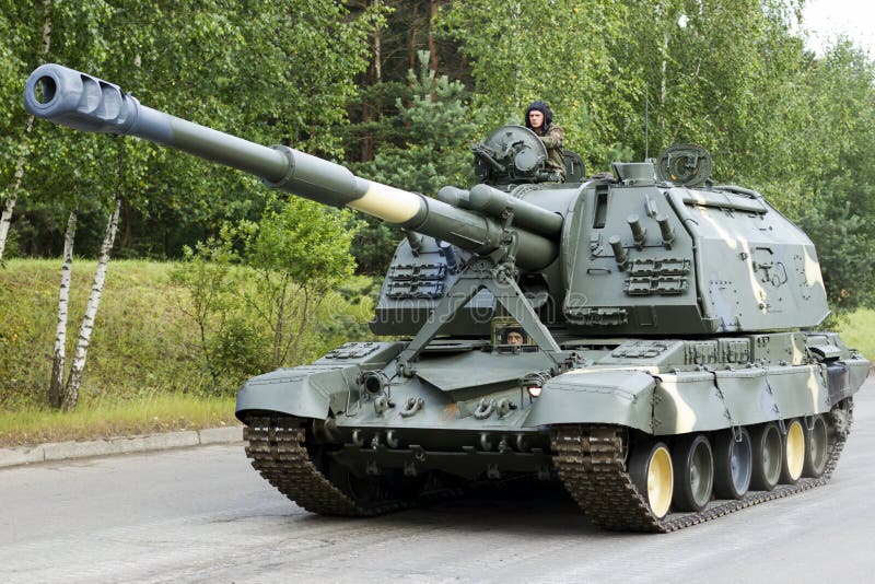 The Tank is Moving Along the Road Editorial Photo Image of trees