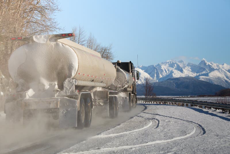 Tanker truck on Alaskan road in winter.