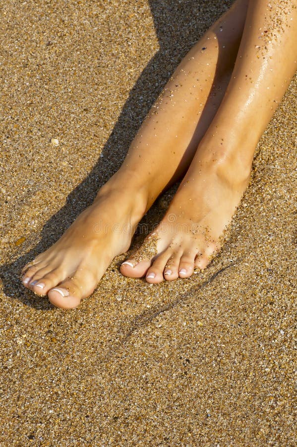 Tanned Legs In The Sand Of The Sea Stock Photo Image Of Tanned