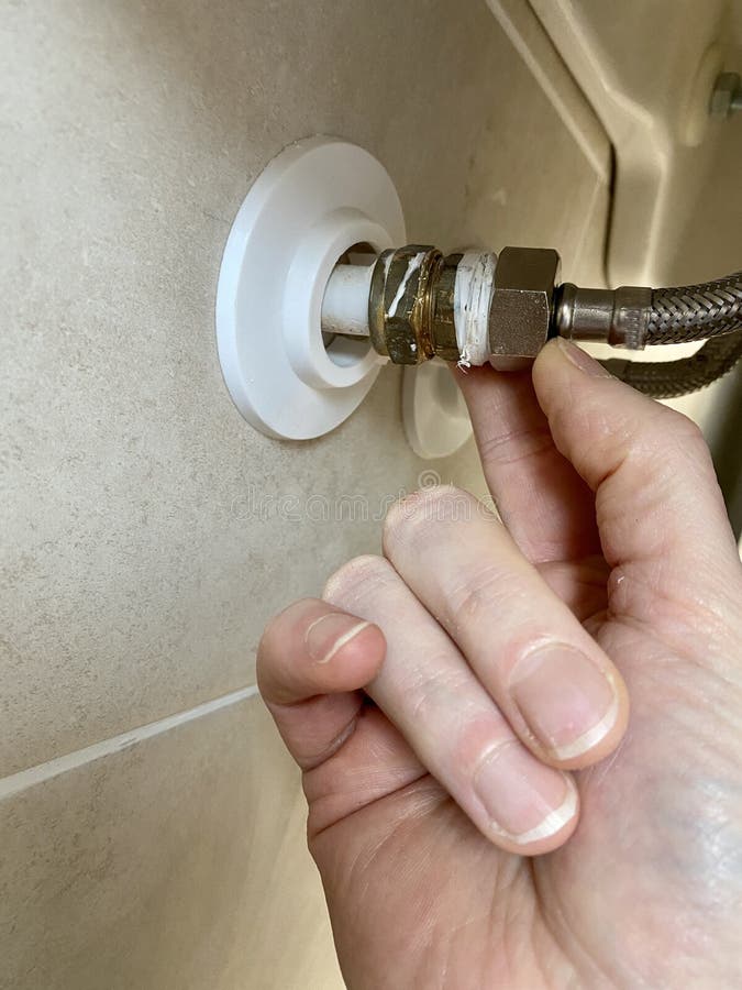 Tap Flexible Connection in Bathroom and Wall Plate Stock Photo Image
