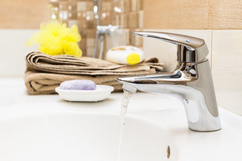 Tap water flows stock image. Image of chrome, clean, home 95217021