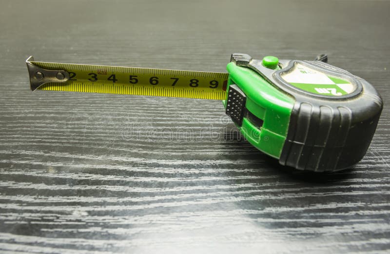 Tape measure on the table. stock image. Image of long 107616059