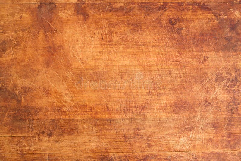 Tappning skrapad träskärbräda arkivbild