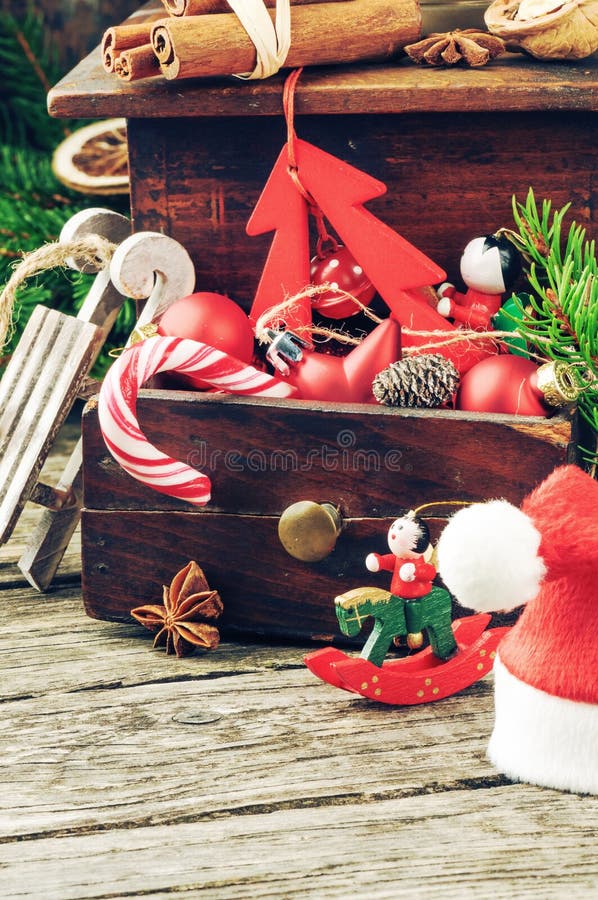 Old wooden box with vintage Christmas decorations. Old wooden box with vintage Christmas decorations