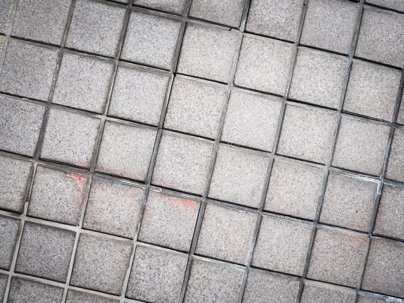 Tappningstildesign av det gråa golvet för textur för mosaiktegelplatta arkivbilder Tappningstildesign av det gråa golvet för textur för mosaiktegelplatta arkivbilder